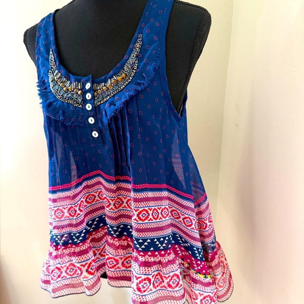Forever 21 Boho Blue & Pink Top
Buy 1/$10 or 2/$15 of any item $15 & Lower-